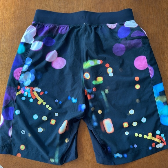 EUC Men’s Lululemon shorts; size small. Black with vibrant design - Picture 3 of 5